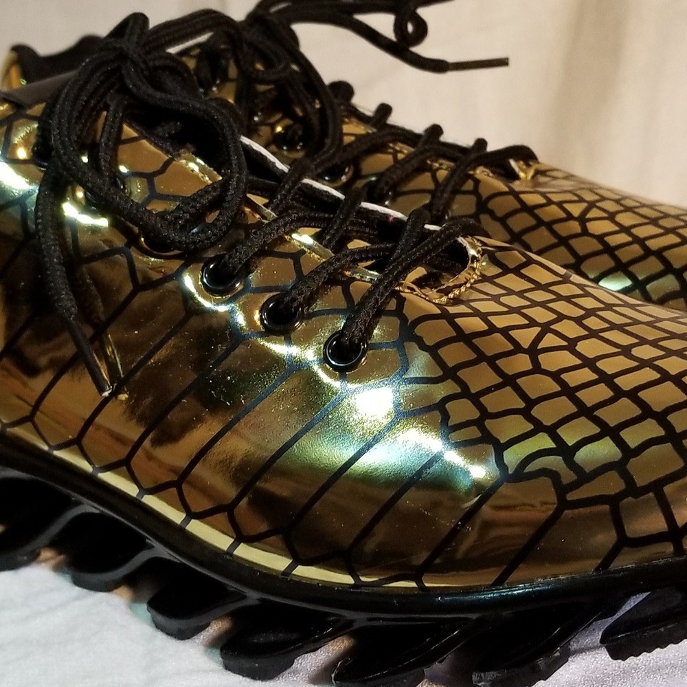 Gold chrome/black athletic style shoes. NWOT.